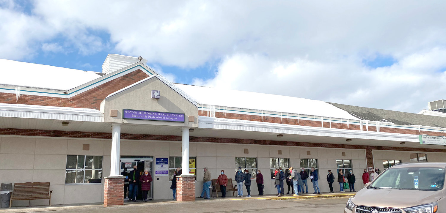 People wait in line for the COVID-19 vaccine at the Wayne Memorial Community Health Centers’ site at the Stourbridge Professional Complex, Honesdale on February 5th.
